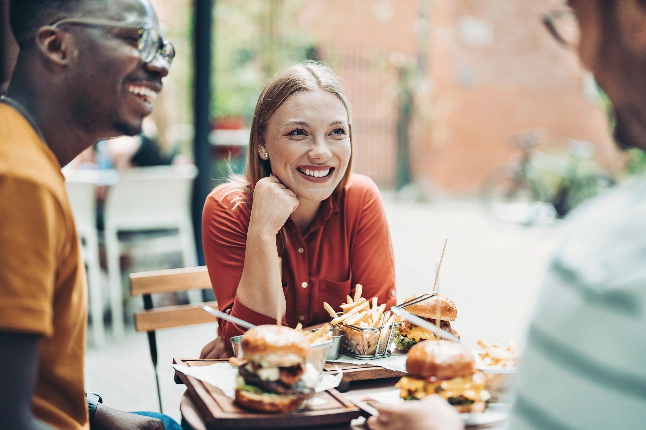 Group of young customers dining together